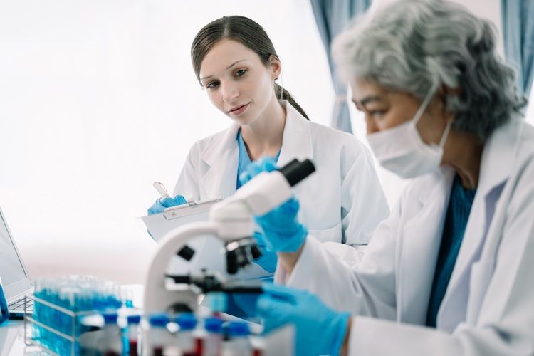 Two researchers at work in a lab