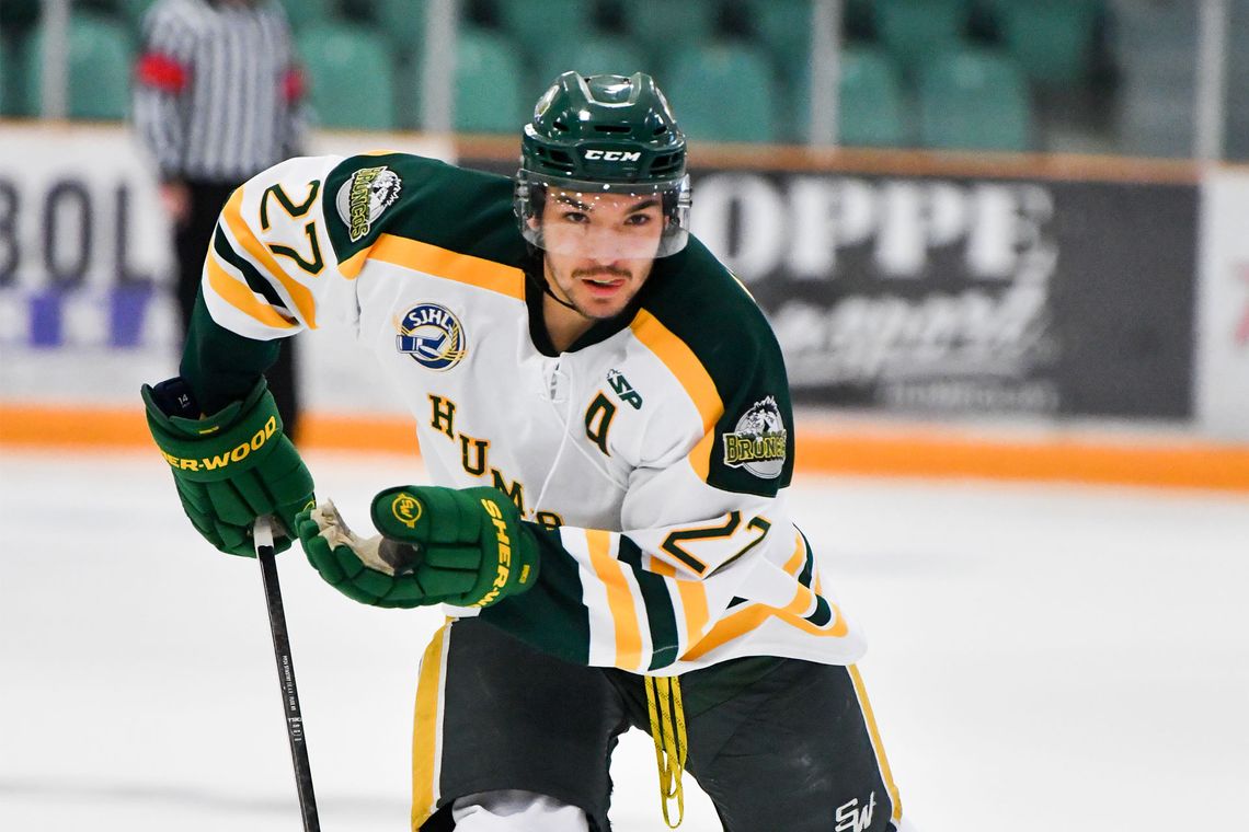 Hockey player Logan Boulet on the ice.
