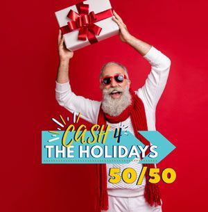 A elderly man holding a gift over his head