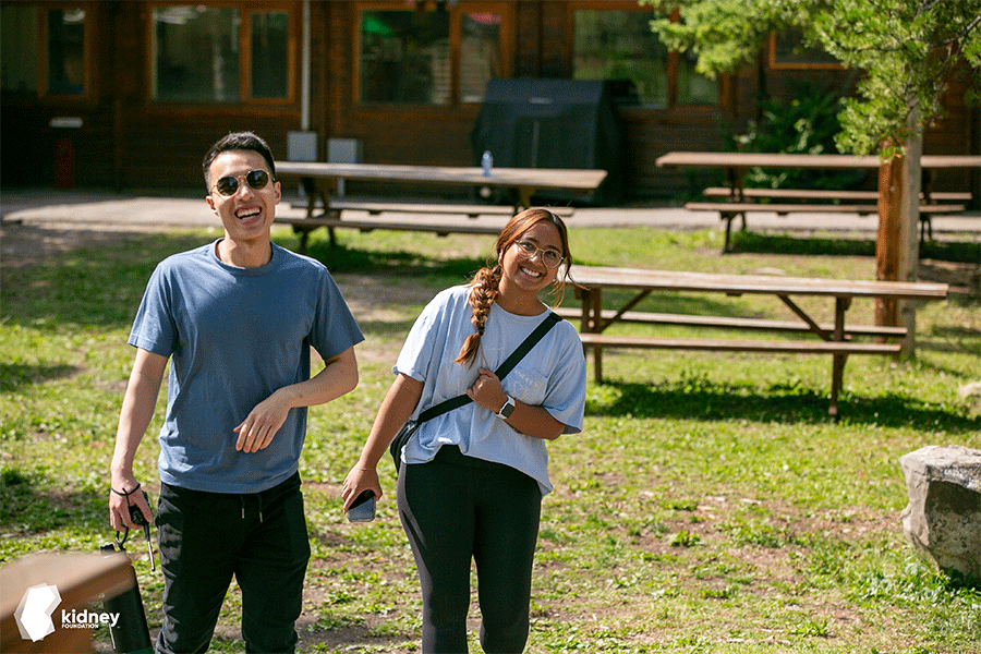 A man and a woman smiling
